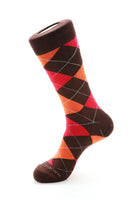 Men’s brown, orange, and red argyle cotton crew sock displayed on white background – The Simple Man