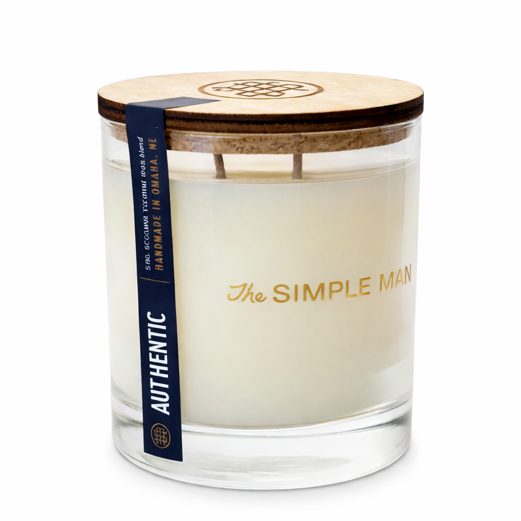 Candle with wooden lid and 'The Simple Man' branding on a white background - Authentic with lid on