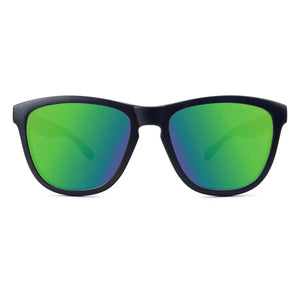 Premiums sunglasses in black with green moonshine lenses, front view, The Simple Man