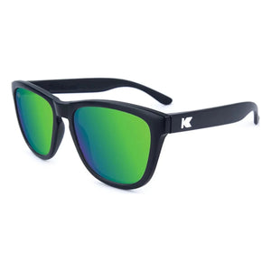 Premiums sunglasses in black with green moonshine lenses, angled view, The Simple Man