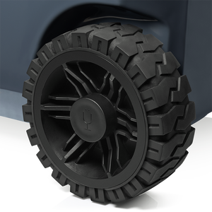 Brümate's brutank all terrain cooler in Nightfall blue close up view of wheel