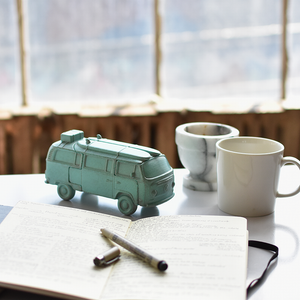 Locknesters Puzzle Bus in Green, shown on a desk