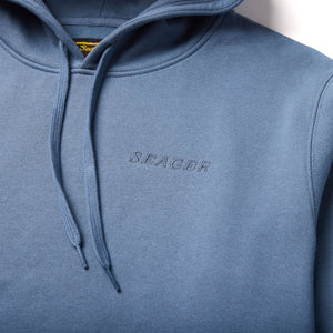 Close-up of Seager petrol blue hoodie showing embroidered logo and drawstrings – durable men's mid-weight hoodie from The Simple Man