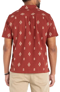 Men's red cotton jacquard camp shirt – back view showing relaxed fit and all-over woven geometric pattern on short sleeve button down