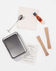 Craft travelers cocktail kit in a small tin, with contents expanded
