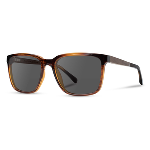 Crag Sunglasses with tortoise frame and grey polarized lenses, angled side view showing the walnut temple