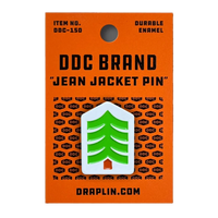 Draplin Design Co. DDC-223 Great Outdoors Tree enamel lapel pin on orange DDC Brand Jean Jacket Pin card — green evergreen tree white enamel pin