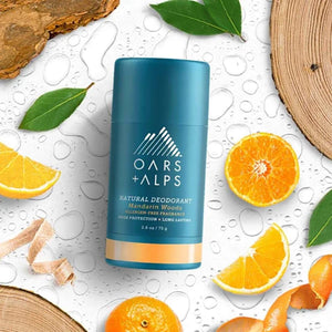 Oars & Alps Aluminum Free deodorant in Mandarin Woods fragrance, stylized ingredient representation view
