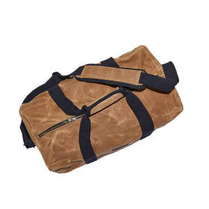 Readywares Waxed Canvas Duffel Bag, angled view showing carry straps