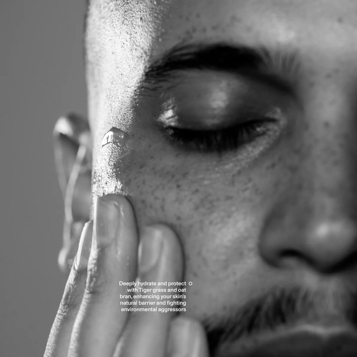 Man applying Blind Barber elixBoost Hydrating Balm to face, deep hydration and protection, The Simple Man