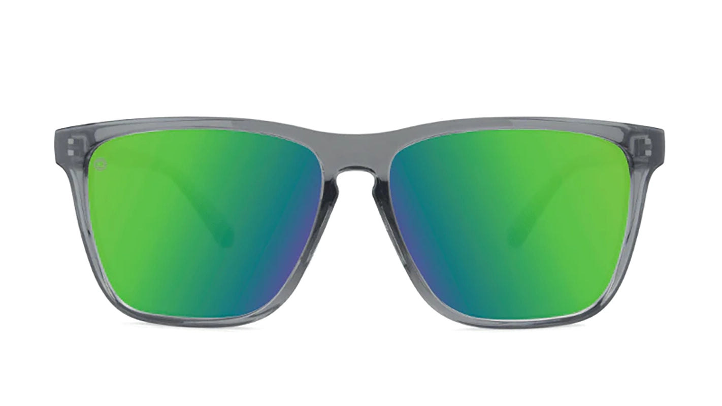 Knockaround Fast lanes Sport sunglasses in clear grey color with green moonshine lenses front view