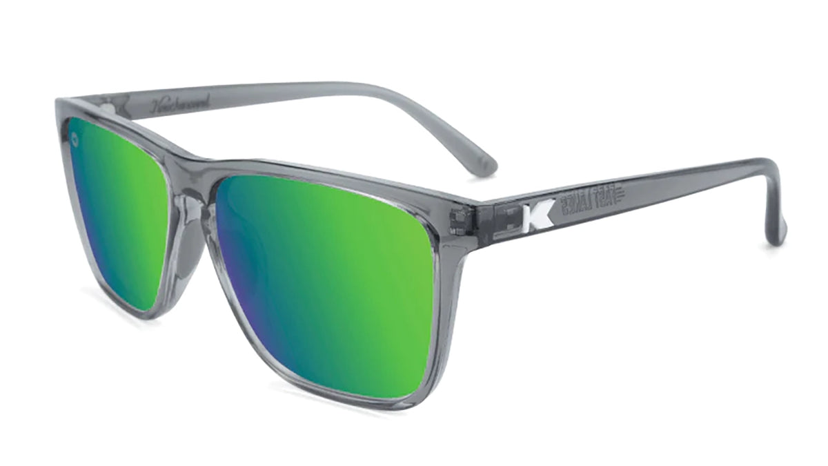 Knockaround Fast lanes Sport sunglasses in clear grey color with green moonshine lenses