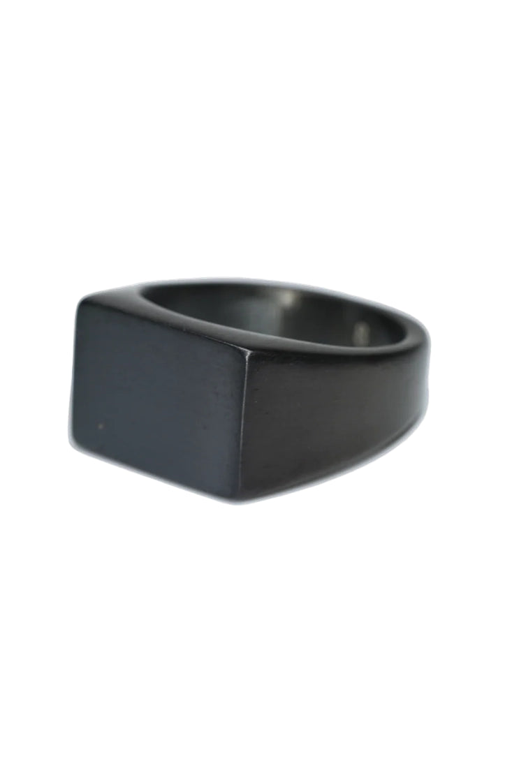 Men’s flat top black stainless steel ring on white background – modern minimalist men’s jewelry from The Simple Man