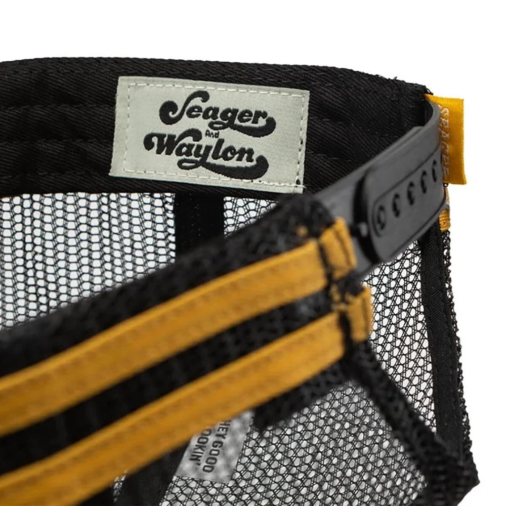 Close-up of interior label on Seager x Waylon Jennings Flying W Snapback featuring “Hey Good Lookin’” tag and adjustable snapback closure