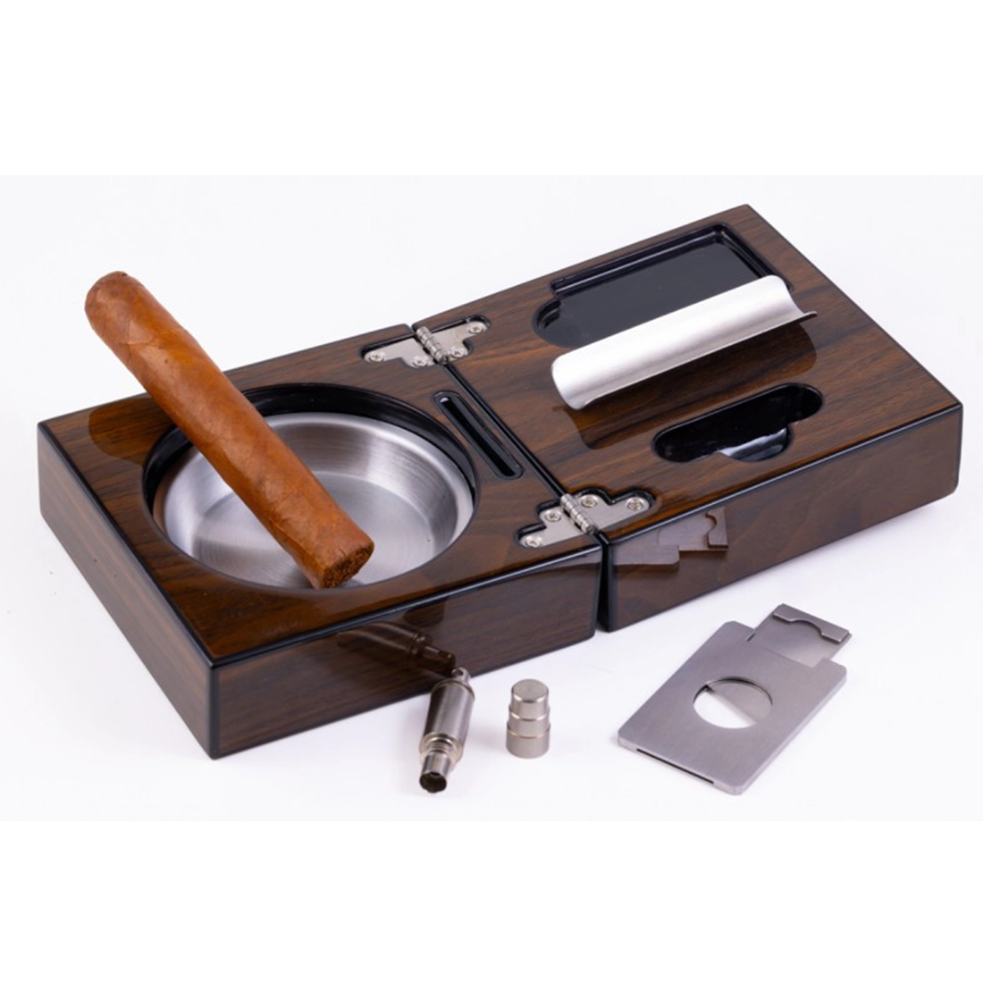 Folding walnut cigar ashtray set fully open with cigar guillotine cutter punch cutter and stainless steel accessories displayed white background