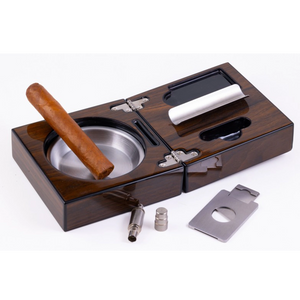 Folding walnut cigar ashtray set fully open with cigar guillotine cutter punch cutter and stainless steel accessories displayed white background