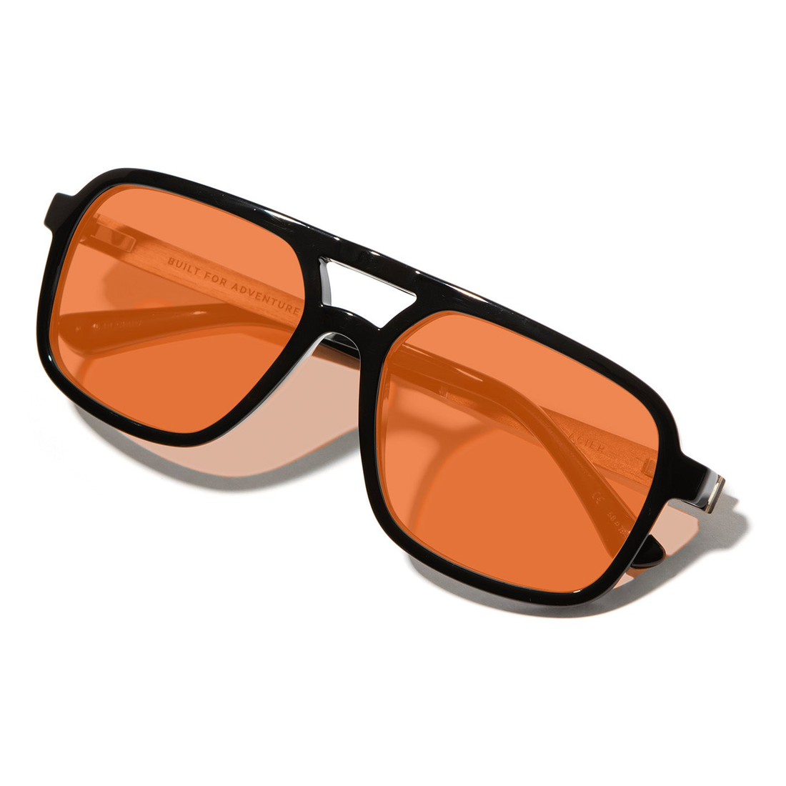 Glacier Sunglasses black frame and amber polarized lenses, three-quarter view