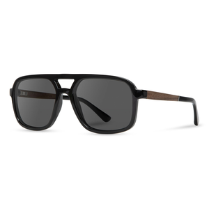 Glacier Sunglasses black frame with walnut temple and grey lenses, angled side view