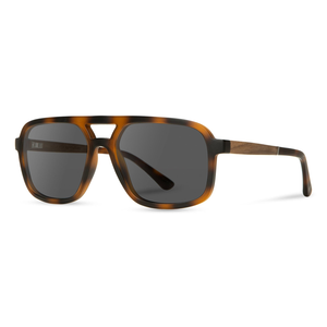 Glacier Sunglasses with matte tortoise frame and HD Plus grey polarized lenses, angled side view showing the walnut temple