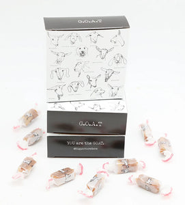Big Picture Farm G.O.A.T. caramel box open with Sea Salt Vanilla caramels scattered — You Are the GOAT Vermont farmstead goat milk caramels white background