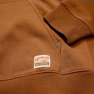 Detail of riveted pocket, ribbed cuff and mfg co badge on Workbench Trade hoodie