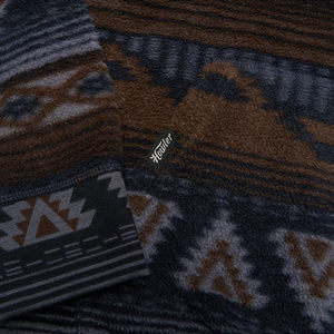 Detail of reverse printed fleece cuff and tag on Tajima hoodie in Winter Sky