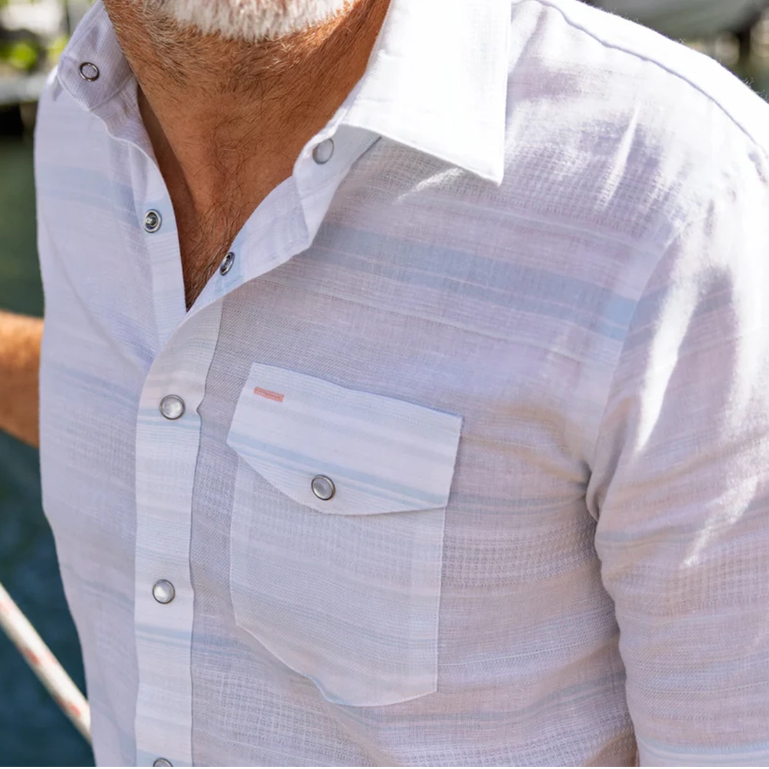 Hemp Stripe Pearl Snap pearl snap and chest pocket detail – organic cotton hemp dobby fabric close-up – The Simple Man