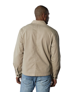 Model Wearing The Normal Brand, James Canvas Overshirt in sand dune color, rear view.