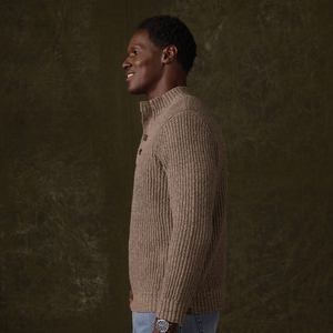 Side view of Taupe boucle popover sweater showing rib cuff and sleeve
