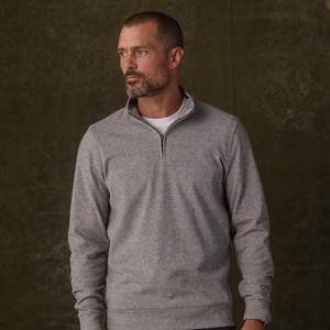 Man in Graphite brushed knit quarterzip layered over a white tee, true-to-size fit