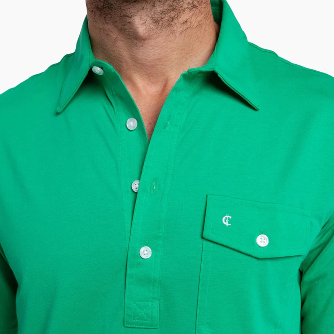 Criquet Performance Players Shirt golf green flat lay showing tri-blend fabric texture
