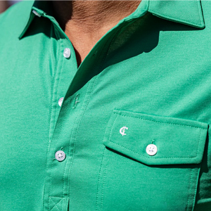 Criquet Performance Players Shirt golf green lifestyle shot on model