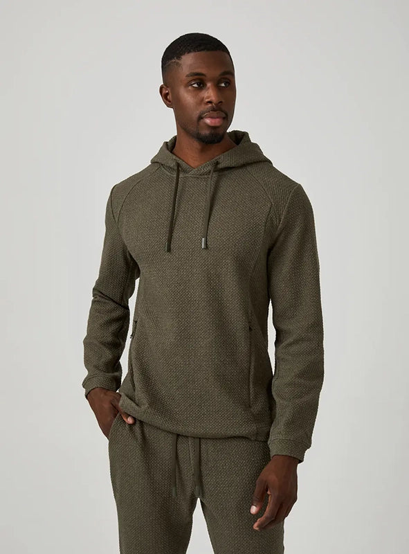 Model Wearing Restoration Hoodie in Olive Front view