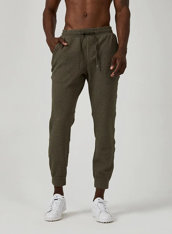 Model Wearing Restoration Joggers in Olive front view