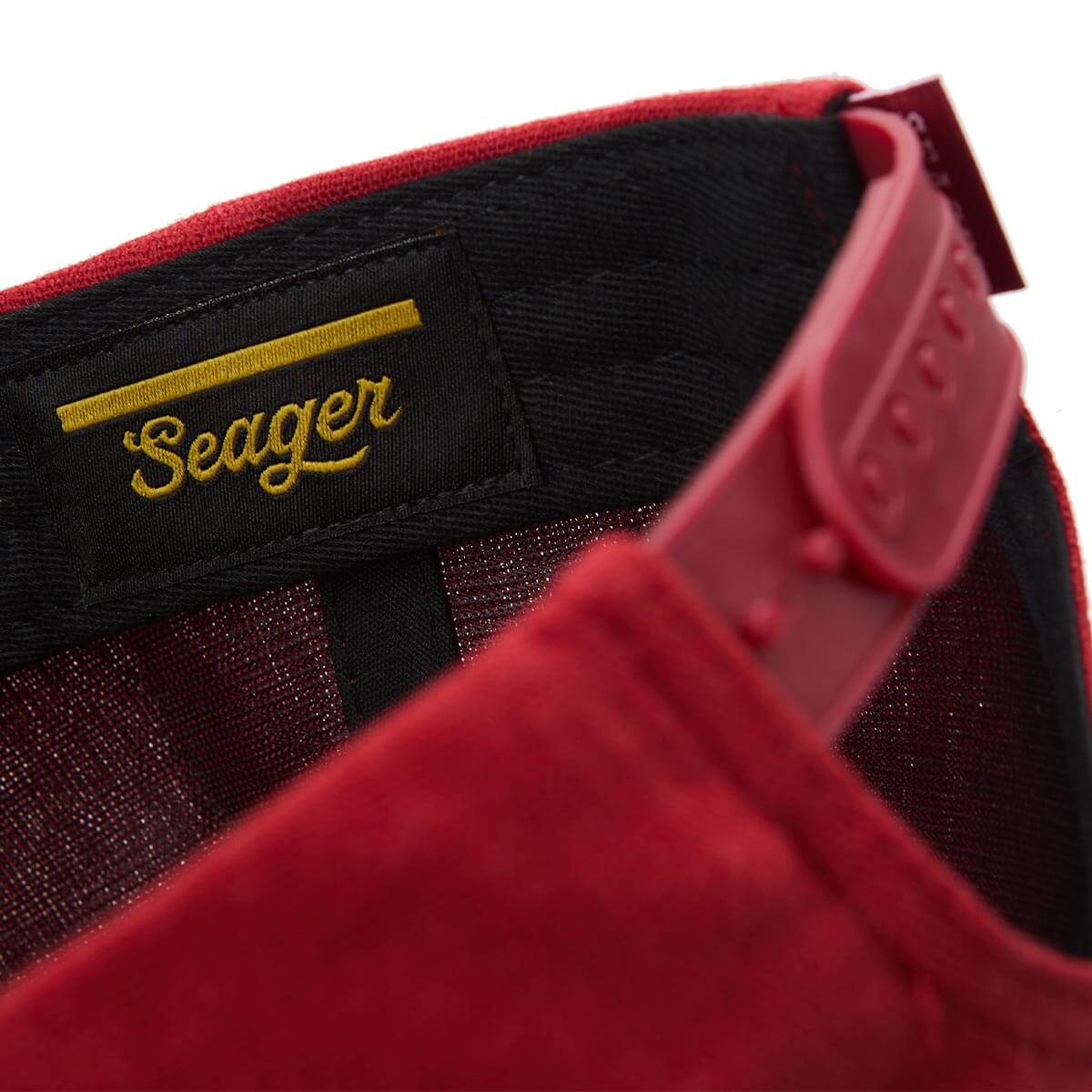 lose-up of Seager logo tag and adjustable snapback closure on Uncle Bill hemp hat