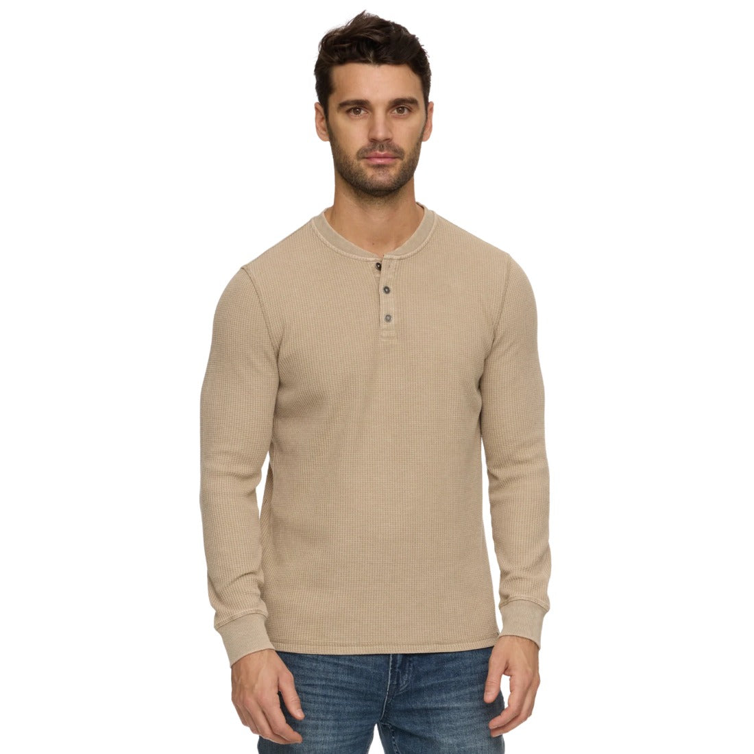 Man wearing the tan vintage soft waffle knit henley with jeans, front view