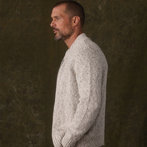 Man wearing Vintage Boucle Track Jacket in Cream Marled, zipped side profile view
