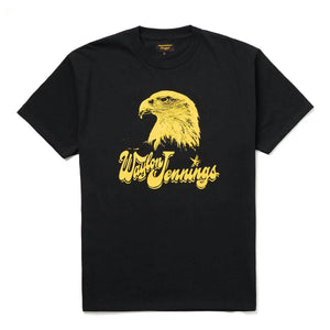 Front view of Seager x Waylon Jennings Eagle Tee in vintage black with bold yellow graphic