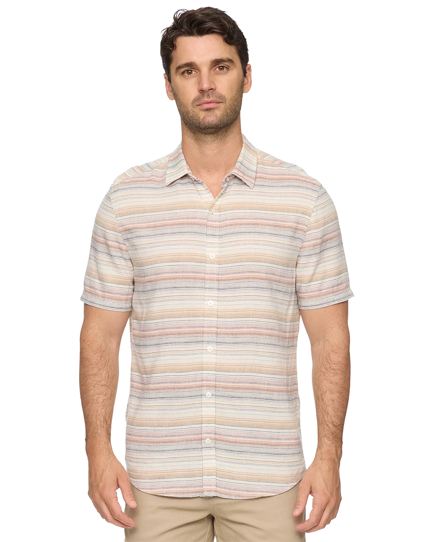 Man wearing Flag and Anthem Westmont stripe linen shirt front view – cream tan blush slate horizontal stripe men's short sleeve button-down