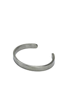 Wide stainless steel cuff bracelet for men – minimalist 8mm wristband from The Simple Man, Omaha men’s accessories collection.