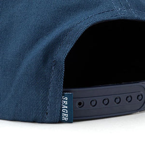 Back view of Wilson Snapback Hat showing adjustable snapback closure and Seager tag