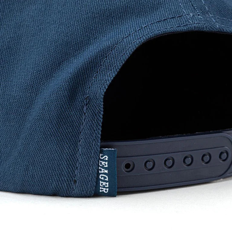 Back view of Wilson Snapback Hat showing adjustable snapback closure and Seager tag