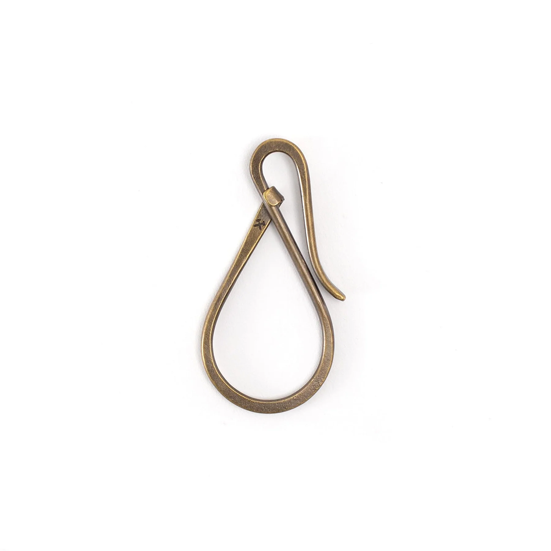 Brass Workshop Keyholder with a teardrop loop, hook closure and crossed hammers hallmark on white
