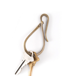 Brass Workshop Keyholder holding two keys on a white background