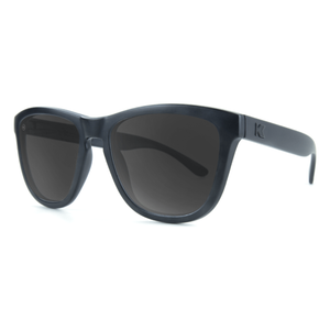 Premiums sunglasses in black with smoke lenses, angled view, The Simple Man
