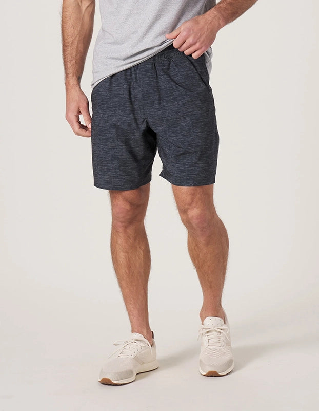 Model Wearing The Normal Brand 7Bros Workout short on Black Front View