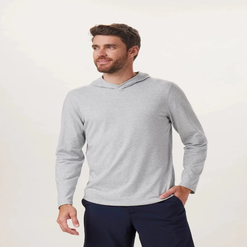 Model Wearing The Normal Brand Active Puremeso Hoodie In Grey - Front View