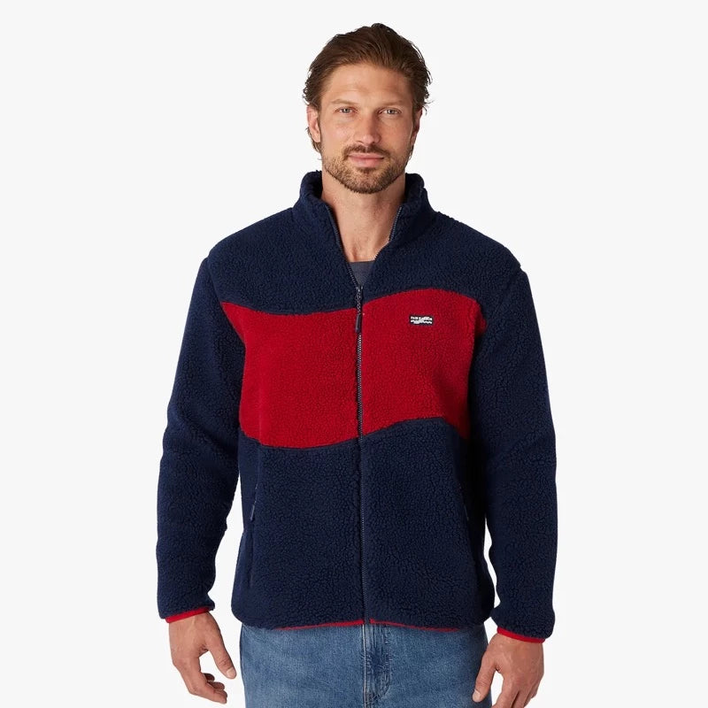 Model wearing Fair Harbor Bayshore Fleece Jacket in red and navy wave front View