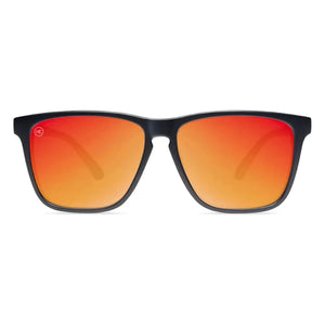 Fast Lanes sunglasses in matte black with red sunset lenses, front view, The Simple Man