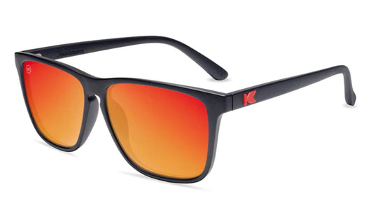 Knockaround Fast lane Sunglasses in Matte Black with Red Sunset lenses Angled front view